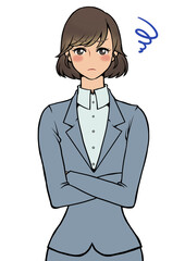 腕組みをして困っているスーツを着た女性