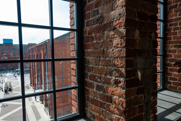 Fototapeta premium Łódź miasto manufaktura widok z okna cegła