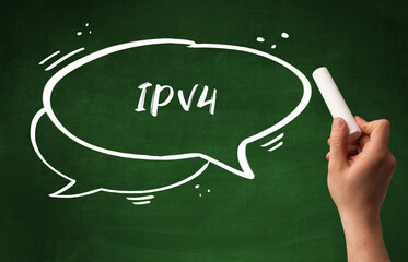 Hand drawing IPV4 abbreviation with white chalk on blackboard