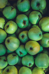green apples in a market