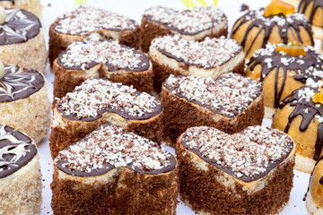 Delicious Balkan confectionary and pastry - rolled pie with poppy seeds, marmalade cakes, sweet pumpkin and cherry pies and thick sweet jelly, fruit kitnikez