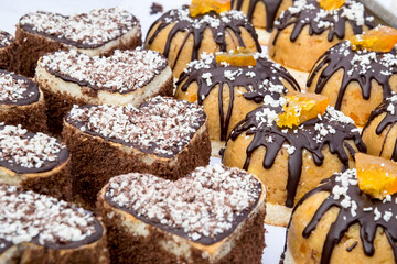 Delicious Balkan confectionary and pastry - rolled pie with poppy seeds, marmalade cakes, sweet pumpkin and cherry pies and thick sweet jelly, fruit kitnikez