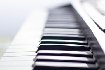 Close up of piano keyboard. Background with soft focus