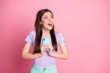 I want many followers. Positive cheerful girl use smartphone look copyspace imagine instagram feedback comment wear purple teal turquoise pants trousers isolated pastel color background