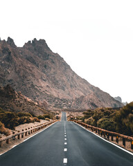 Straight road to the mountains