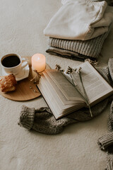 Fototapeta na wymiar Autumn still life with a book and a cup of coffee