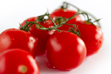 cherry tomatoes on a white background