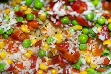 Hawaiian rice with peppers green peas corn. cooked in a frying pan background.