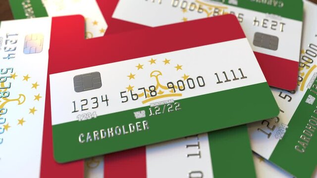 Many credit cards with flag of Tajikistan