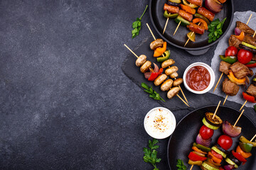 Grilled kebabs with meat, mushrooms and vegetables