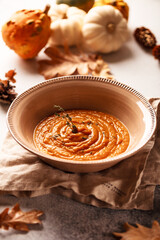 Pumpkin soup. Autumn pumpkin soup on a white background.