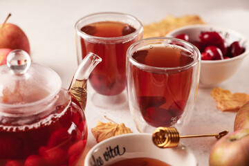 Autumn tea with dogwood. Dogwood tea and Apple jam. Autumn tea. Composition with tea and autumn colors