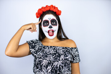 Woman wearing day of the dead costume over isolated white background smiling and thinking with her fingers on her head that she has an idea.