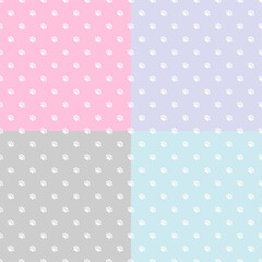 Cute seamless Patchwork quilt pattern with paw prints. Great for baby fabric, textile, nursery wallpaper. Childish vector background. Pastel Colors.
