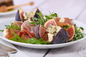 Prosciutto with figs and blue cheese