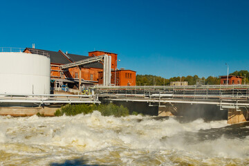 Rough waters of bypass on rapids Kuusankoski, Finland