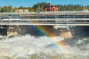 Beautiful rainbow on bypass at rapids Kuusankoski, Finland
