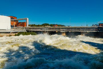 Rough waters of bypass on rapids Kuusankoski, Finland
