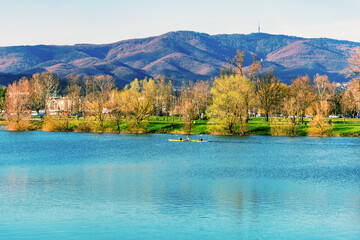 View of Jarun lake and Sljeme mountain in spring. Zagreb, Croatia