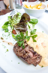 juicy steak veal beef meat with tomato and vegetables