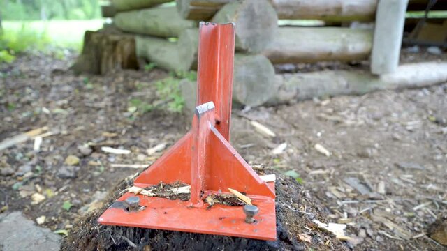 Closer look of the firewood splitter on the forest