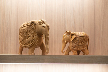 wooden elephant statue on a table
