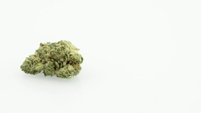 Looping 360 Degree Rotation of the Marijuana Strain, AMF, 
Single Bud, Left Screen, in 4K Ultra HD Resolution 3840 x 2160