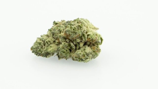 Looping 360 Degree Rotation of the Marijuana Strain, AMF, 
Single Bud, Center Screen, in 4K Ultra HD Resolution 3840 x 2160