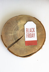 black Friday label on a wooden background