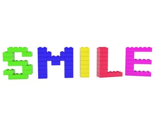 SMILE concept from colored toy bricks to white