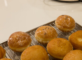 donuts and bread on tray 