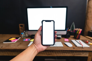 Smartphones on the desk and green devices, smart phone mockups
