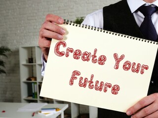 Financial concept meaning Create Your Future with sign on the page.