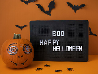 painted pumpkin with vampire fangs