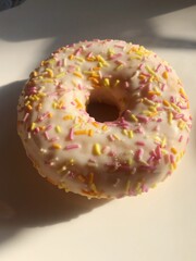 Delicious donut with vanilla and cream macro