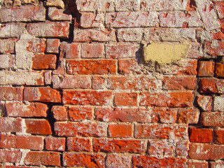 Old destroyed brick wall. red brick texture. II