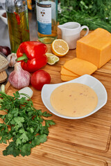 Many different spices, vegetables and ingredients, and fresh herbs for making homemade sauce