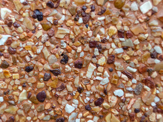 The surface of the walls decorated with small stones.