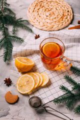 Fototapeta na wymiar hot winter tea with cinnamon, star anise and ginger cookies