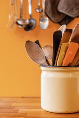 kitchen utensils on a wooden table