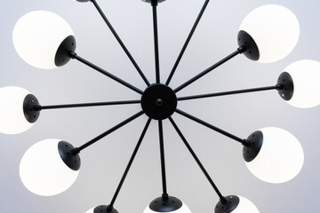 Indoor ceiling chandelier. Chandelier art of shape