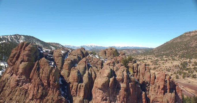 Drone view flying to spire rocks in Colorado mountains