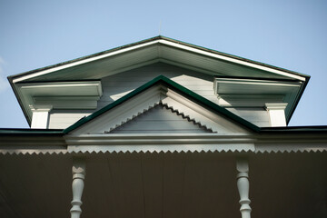 The ridge of the roof of an old house. Decoration of the roof visor in the 19th century. 