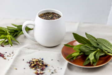 herbal tea with mint leaves and rose petals