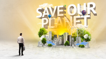 Rear view of a businessman standing in front of SAVE OUR PLANET inscription, Environmental protection concept