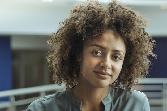 Portrait of african american businesswoman in a corporate office - Powered by Adobe