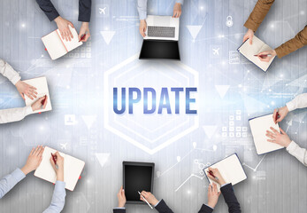 Group of Busy People Working in an Office with UPDATE inscription, modern technology concept