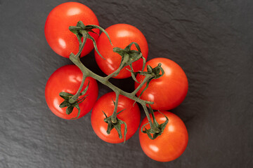 ripe tomatoes on the board
