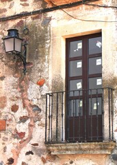 An old balcony in Caceres city, Spain.