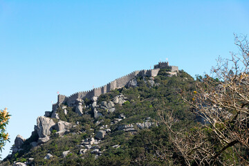 Fototapeta na wymiar Sintra, Portugal - February 2020: castle of the Moors (Castelo dos Mouros)